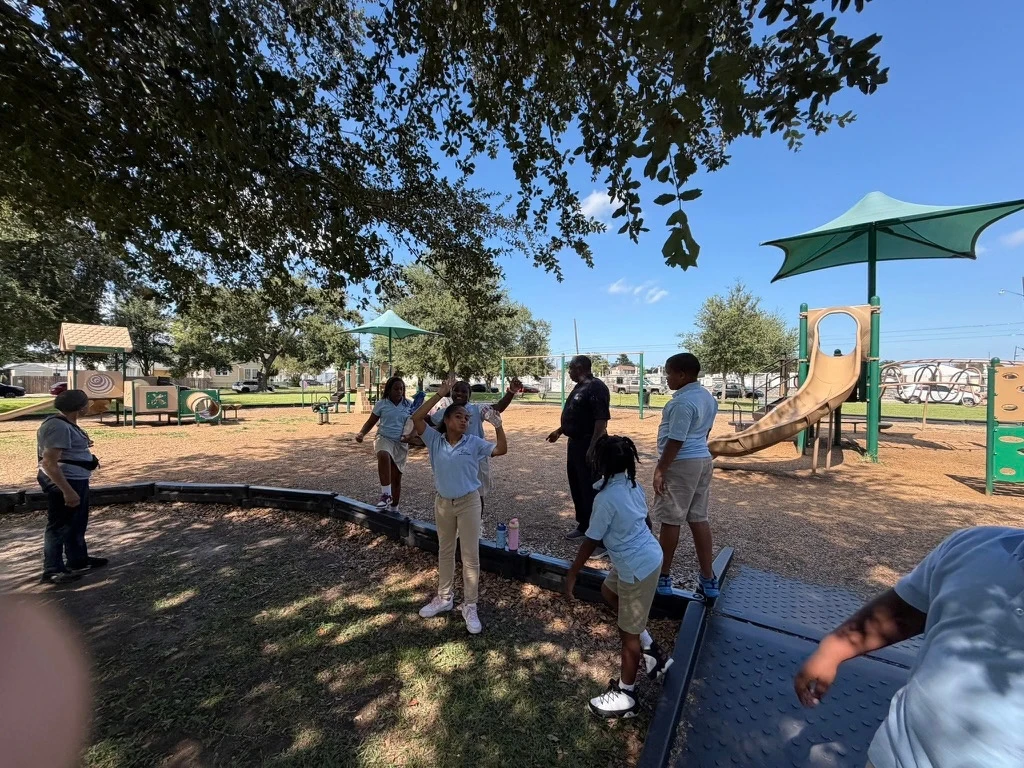 Students spend time together at a playground